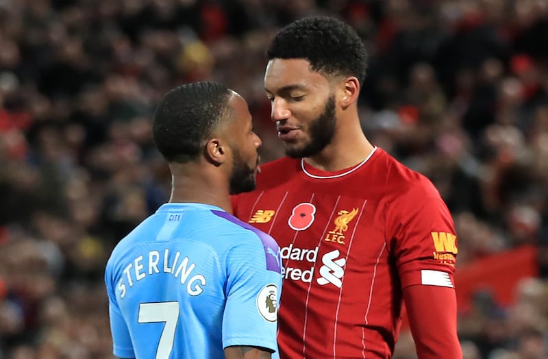 Liverpool's Joe Gomez (right) and Manchester City's Raheem Sterling clash during the Premier League match at Anfield. A day later Sterling was suspended by the FA after the dispute spilled over to the England canteen. PA