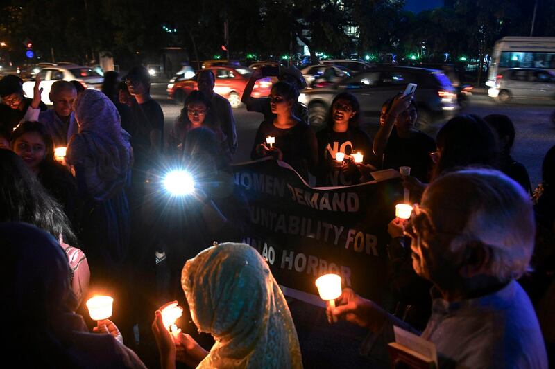 People hold a candlelight vigil in support of sexual assault victims and against the alleged rape and murder of a 27-year-old veterinary doctor in Hyderabad, in Bangalore. AFP