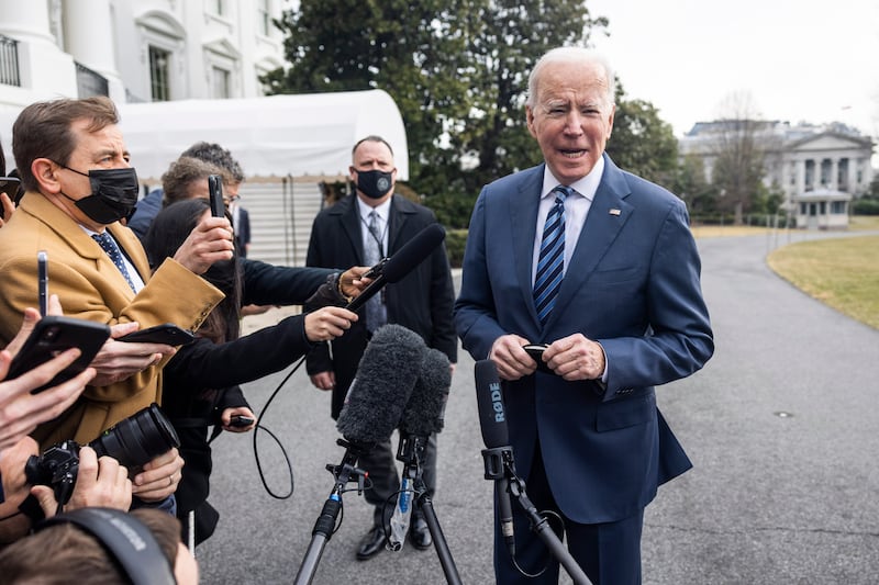 US President Joe Biden speaks to the media about Russia's buildup on the Ukrainian border as he leaves the White House in Washington. EPA