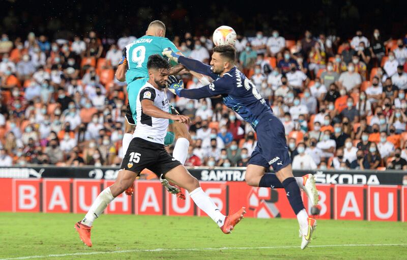 Karim Benzema scores Real Madrid's second goal against Valencia. Getty Images