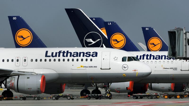 (FILES) In this file photo taken on March 27, 2020 airplanes of German airline Lufthansa are parked at the "Franz-Josef-Strauss" airport in Munich, southern Germany, amid novel coronavirus COVID-19 pandemic. Lufthansa says on May 7, 2020 in talks for German govt to take 25% stake in 9 bn-euro rescue / AFP / Christof STACHE
