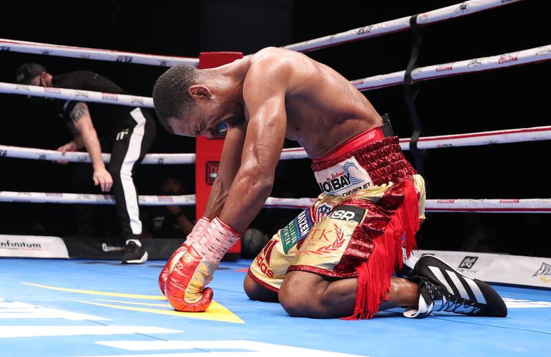 Jamel Herring of the US celebrates after Carl Frampton's corner threw in the towel in Round 6.