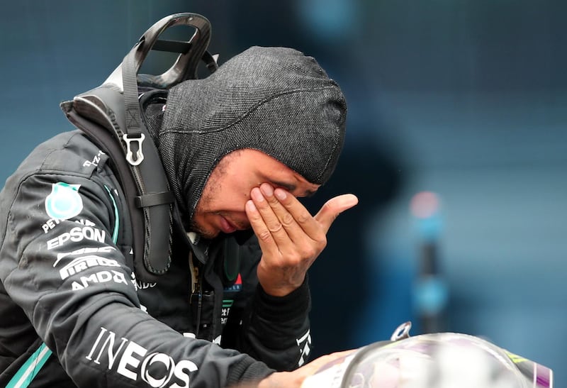 An emotional Lewis Hamilton after winning the Turkish GP for Mercedes, and with it the world title. Reuters