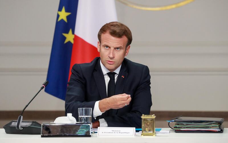 French President Emmanuel Macron attends a meeting with labour union representatives and at the Elysee Palace in Paris, on June 24, 2020. / AFP / POOL / Ludovic MARIN
