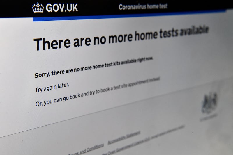The British government's website displays a message that there are no Covid-19 lateral flow home test kits available to order on December 13, 2021. AFP