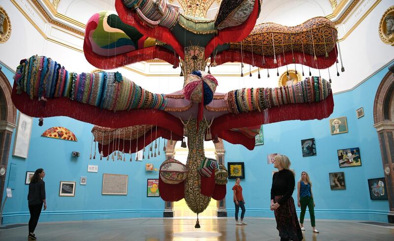 epa06786192 People view the work 'Royal Valkyrie' by Portuguese artist Joana Vasconcelo during the media preview of Summer Exhibition at the Royal Academy of Arts in London, Britain 05 June 2018. The Royal Academy of Arts Summer Exhibition is in its 250th year. The open exhibition displays over one thousand works and was co-ordinated by British Artist Grayson Perry.  EPA/NEIL HALL