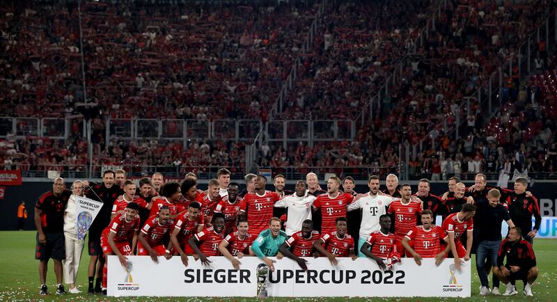 Bayern Munich players celebrate winning the German Super Cup 2022 after beating RB Leipzig at Red Bull Arena in Leipzig, Germany. Getty Images