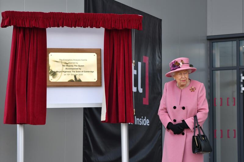 Britain's Queen Elizabeth looks on after unveiling a plaque. Reuters