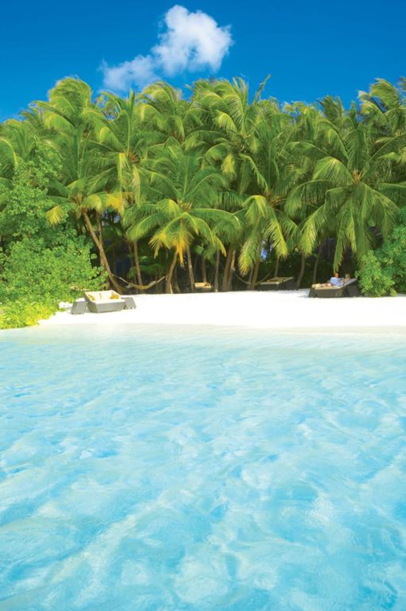 The view of one of Baros Maldives private beaches from the water. Courtesy Baros Maldives