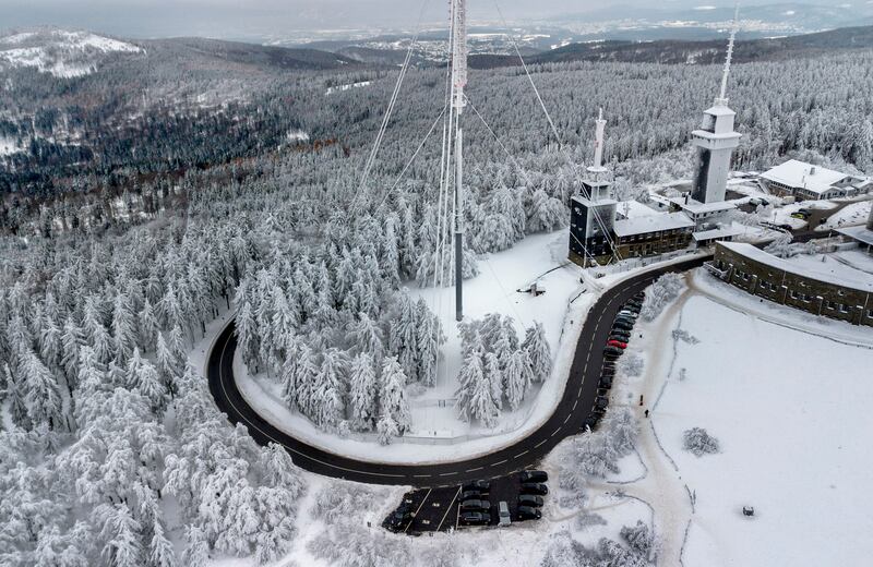 Buildings and telecommunication devices covered with snow and ice on Feldberg mountain near Frankfurt, Germany. AP