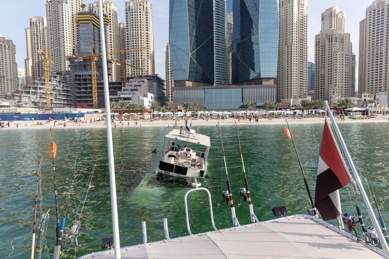 DUBAI, UNITED ARAB EMIRATES.  08 JANUARY 2019. A sunken yacht being salvaged by it’s owner Mohamed Irfan and some volunteer divers off the beach on JBR. (Photo: Antonie Robertson/The National) Journalist: None. Section: National.
