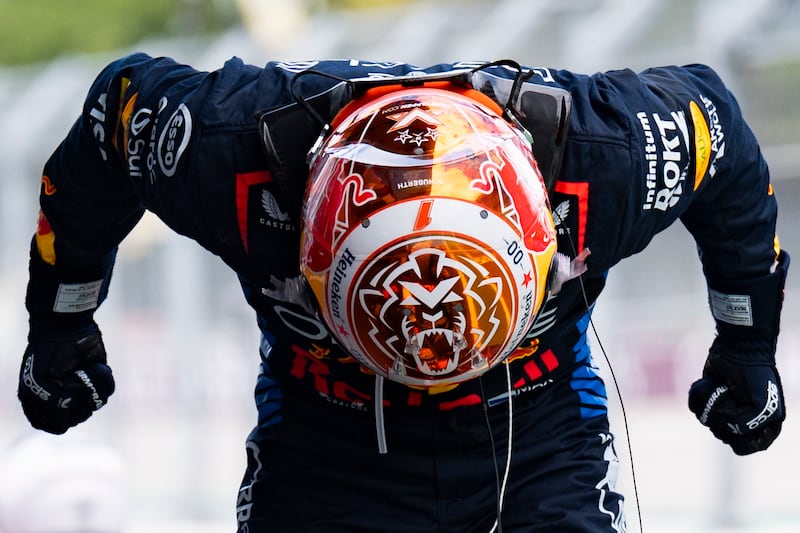 Red Bull Racing driver Max Verstappen celebrates after winning the Spanish Grand Prix. The Dutchman now leads the drivers' championship by 69 points. EPA