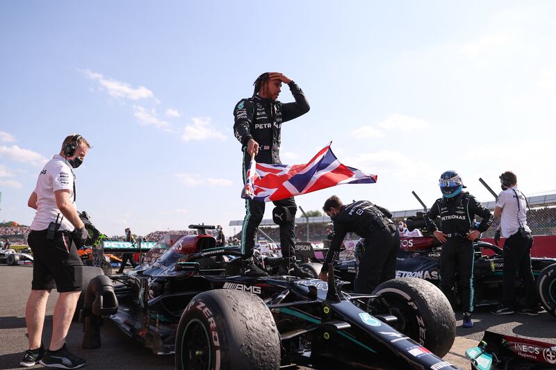 Mercedes' driver Lewis Hamilton celebrates after winning the Formula One British Grand Prix at Silverstone on Sunday, July 18.