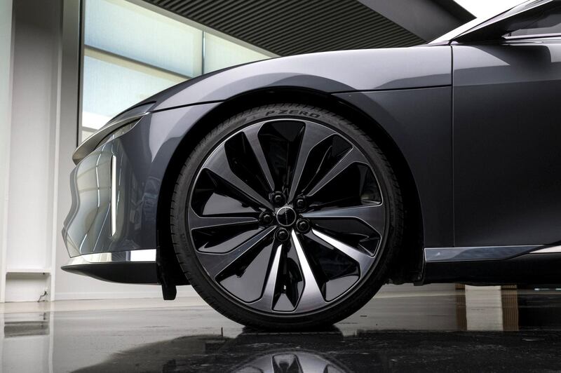 The front wheel of a Lucid Air prototype electric vehicle, manufactured by Lucid Motors Inc., is displayed at the company's headquarters in Newark, California, U.S., on Monday, Aug. 3, 2020. The final specs and design of the Lucid Air are due to be unveiled at an event in September and executives say customers can now expect delivery of the first batch of Airs in spring 2021. Photographer: David Paul Morris/Bloomberg