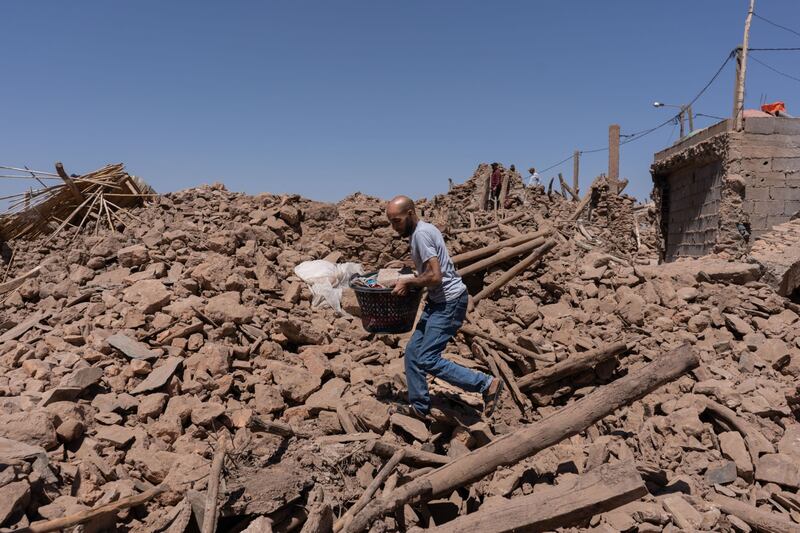 Villagers search the rubble of destroyed buildings after the earthquake near Amizmiz, in El Haouz region of Morocco.  Bloomberg
