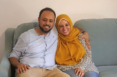 Egyptian human rights lawyer Mohamed Al Baqer with his wife Neamatallah Hisham at their home in Cairo on Thursday. AFP