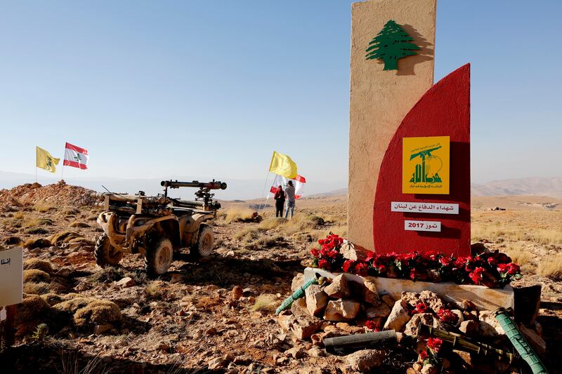 epa06116879 A monument to the martyrs of Hezbollah in a military position of Hezbollah in a mountainous area in Juroud of Arsal at the Lebanese -Syrian border 29 July 2017.  A tour for Lebanese and foreign media at the liberated positions of Al-Nusra terrorist group , guided by the media office of Hezbollah, shows their fighters along the border with Syria. A ceasefire deal has been reached, that will see Al-Nusra fighters withdraw from the Syria-Lebanon border to Idlib province in Syria , a top Lebanese official said on July 27 after a week-long of military operation there by the Hezbollah movement.  EPA/Nabil Mounzer