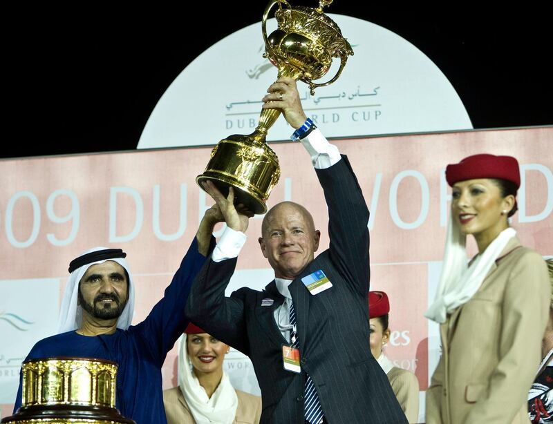 United Arab Emirates -Dubai- March 28, 2009:

NEWS: Sheikh Mohammed Bin Rashid Al Maktoum and owner Bill Casner pose with the trophy after winning the 2009 Dubai World Cup in the Nad Al Sheba Racecourse in Dubai on Saturday, March 28, 2009. Well Armed, took home the U.S. $6,000,000 prize. Amy Leang/The National  
 *** Local Caption ***  na29mr-PG3main.jpg