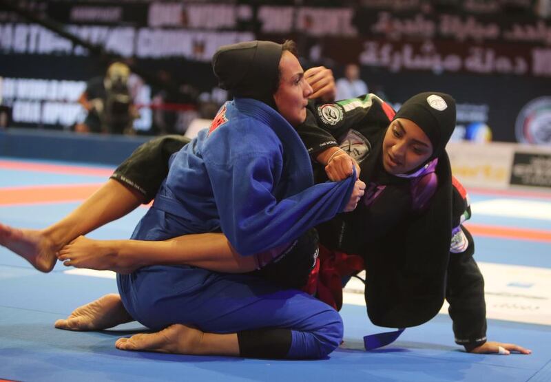 Alyazyah Al Shehyari (in black) of the UAE shown in her match with May Sherif Mahmoud of the UAE in the Abu Dhabi World Youth Jiu-Jitsu Championship 2016. Ravindranath / The National