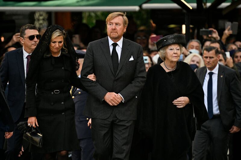 Former queen of the Netherlands Beatrix, Netherlands' King Willem-Alexander and Queen Maxima arrive for the funeral of Constantine, former king of Greece. AFP