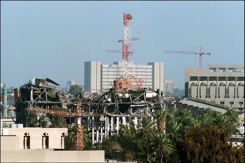 A view dated 08 March 1991 of damaged buildings and a communication tower in downtown Baghdad that were hit in February 1991 by an Allied air strike or missiles raid. Iraq's invasion of Kuwait 02 August 1990, ostensibly over violations of the Iraqi border, led to the Gulf War which began 16 January 1991. A US-led multi-national force repulsed Iraq from Kuwait and a cease-fire was signed 28 February 1991. (Photo by GEORGES GOBET / AFP)