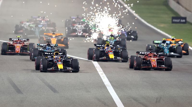 Red Bull Racing's Max Verstappen leads the pack at the start of the race. EPA