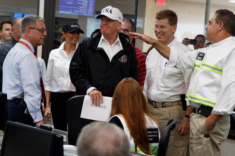 President Donald Trump and first lady Melania Trump participate in a tour of the Texas Department of Public Safety Emergency Operations Center in Austin, Texas.  Evan Vucci / AP Photo