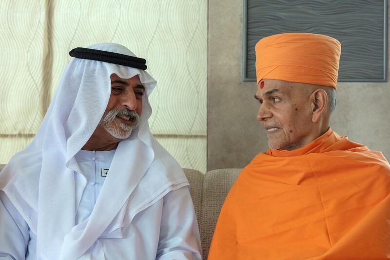 Sheikh Nahyan warmly receives Mahant Swami Maharaj at his majlis in Abu Dhabi.