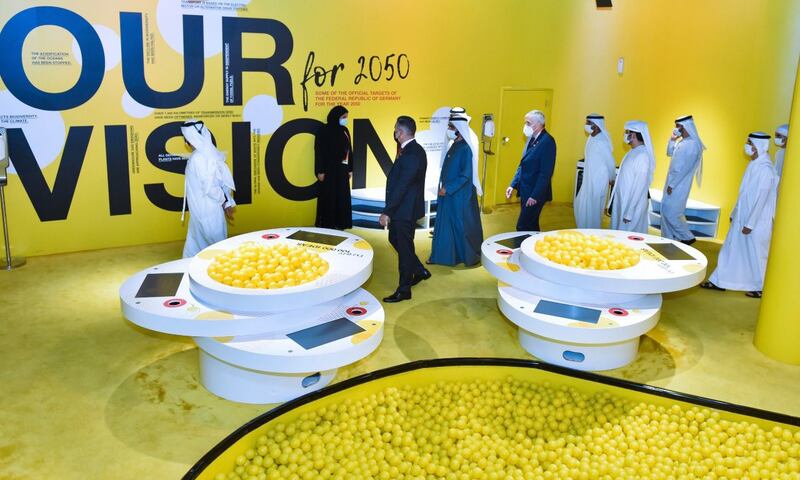 The pavilion's Welcome Hall has a large pit filled with 100,000 yellow balls, each with a message.