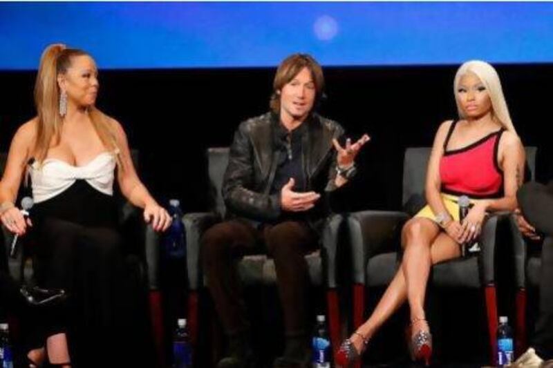 Mariah Carey, Keith Urban and Nicki Minaj are American Idol's season 12 judges. Carey and Minah made headlines in October with a skirmish that escalated into tantrums and threats. Imeh Akpanudosen / AFP