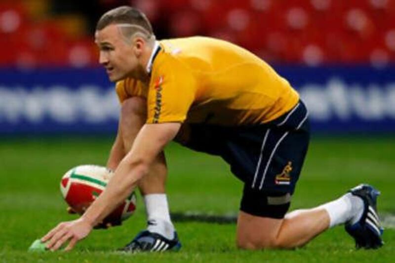The Australia fly-half Matt Giteau practices his kicking before the game against Wales at Cardiff's Millennium Stadium last weekend.