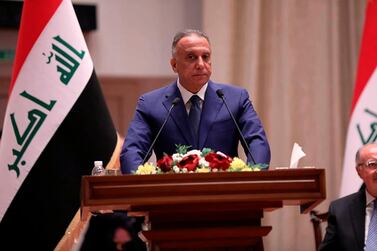 Iraqi Prime Minister Mustafa Al Kadhimi speaks to members of the Iraqi parliament in Baghdad, Iraq on May 7. AP