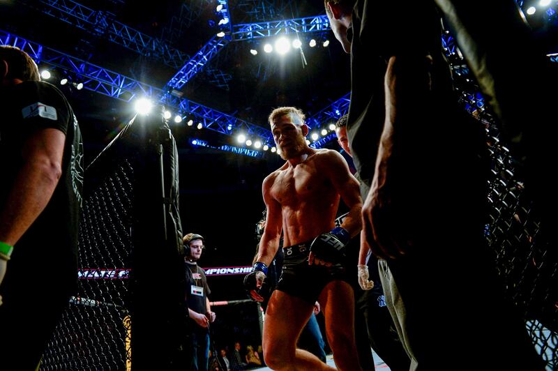 Ireland's Conor McGregor leaves the cage after defeating USA's Marcus Brimage in their UFC fight at the Globe Arena in Stockholm, Sweden, on April 6, 2013.