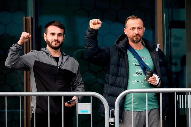 Survivors of the twin mosque shootings react as they arrive at Christchurch High Court for the sentencing hearing of Brenton Tarrant, in Christchurch. AFP