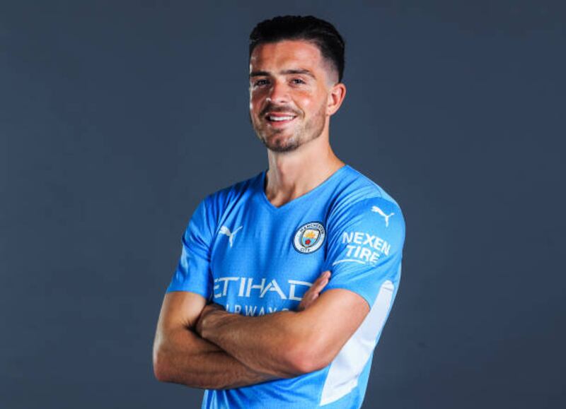Manchester City have completed the signing of England midfielder Jack Grealish on a six-year deal.