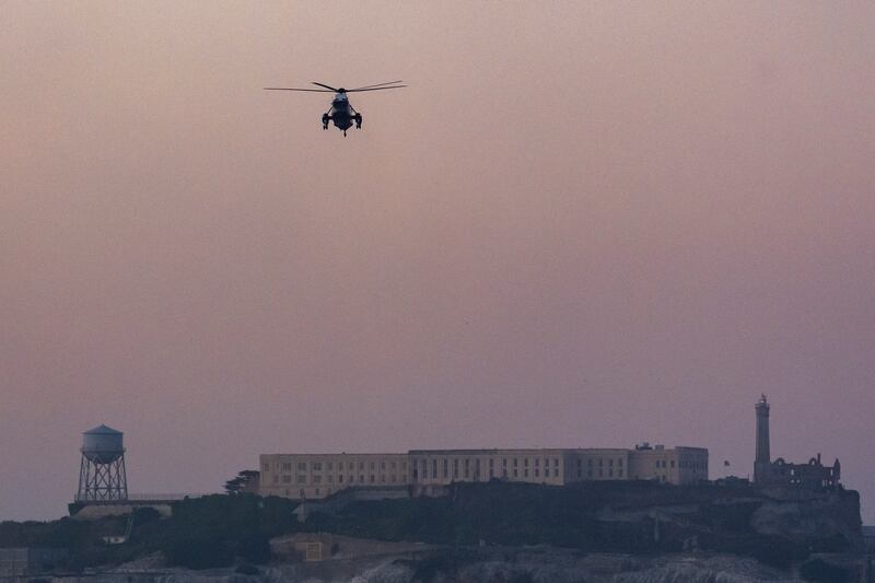 Marine One, with US President Joe Biden aboard, flies over Alcatraz Island as it prepares to land in San Francisco. AP