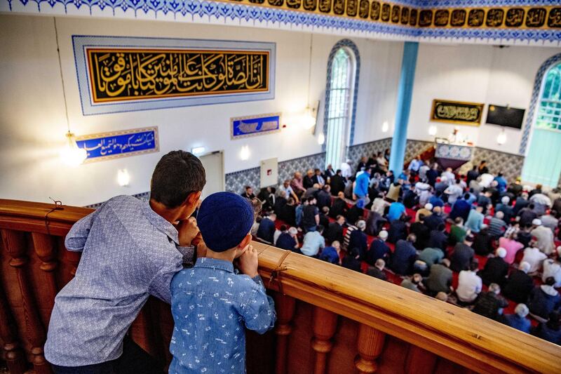 Muslims attend morning prayer in the Mevlana Mosque in Rotterdam, the Netherlands.  EPA