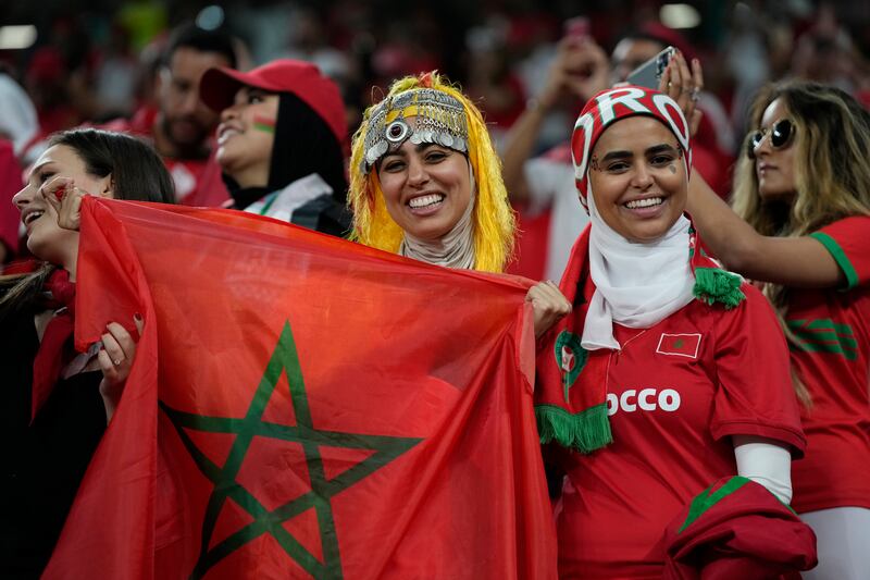 Morocco's supporters hope to see their team make history by reaching the knockout stages for only the second time in their history. AP Photo