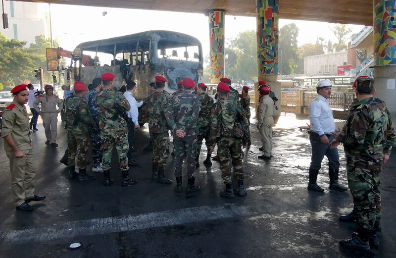 An army bus after an attack in Damascus last year. Eighteen soldiers were killed in a similar attack on Thursday, according to Syria's Defence Ministry. AFP