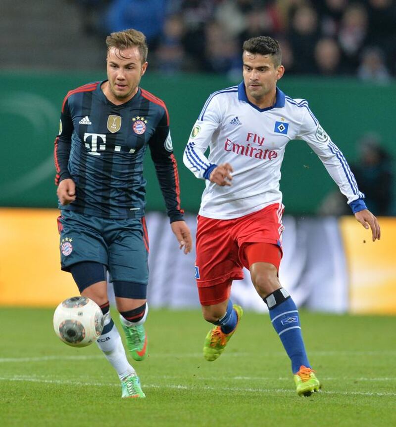 Hamburg's Venezualan midfielder Tomas Rincon, right, will try to help his national side build on their semi-final run in last year's Copa America. AFP PHOTO / CARMEN JASPERSEN

