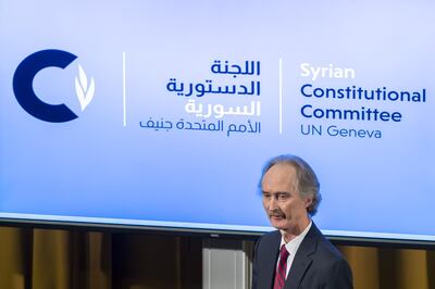 epa07959638 Geir O. Pedersen (R), Special Envoy for Syria, leaves the poduim after the first meeting of the Syrian Constitutional Committee, at the European headquarters of the United Nations in Geneva, Switzerland, 30 October 2019.  EPA/MARTIAL TREZZINI