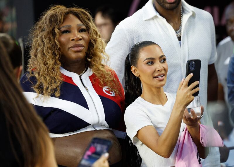 Tennis star Serena Williams with Kim Kardashian during the match. Reuters
