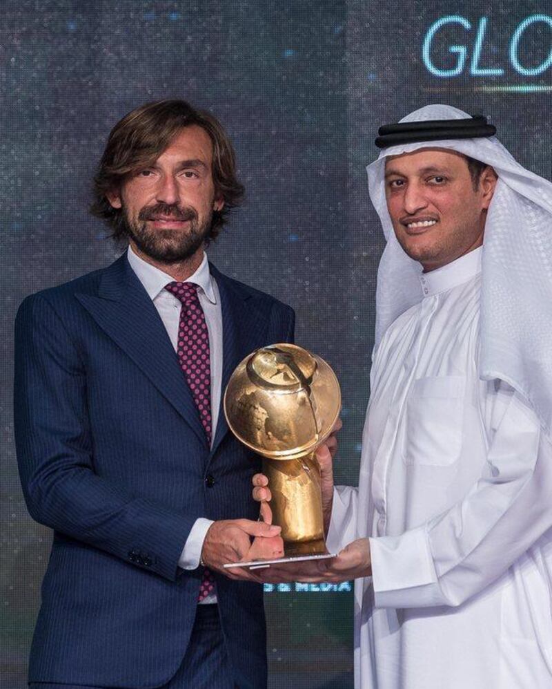 Andrea Pirlo shown being given a 'Player Career Award' on Sunday at the Globe Soccer Awards in Dubai. EPA Photo