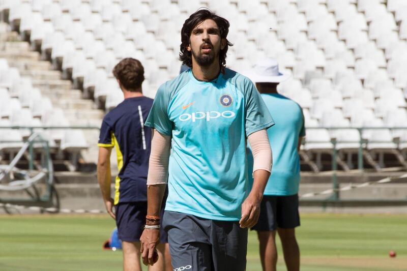 India's bowler Ishant Sharma, walks up the crease as he takes part in training session at the Newlands Cricket ground on January 3, 2018, in Cape Town, prior to the first of three cricket tests matches between South Africa and India. / AFP PHOTO / RODGER BOSCH