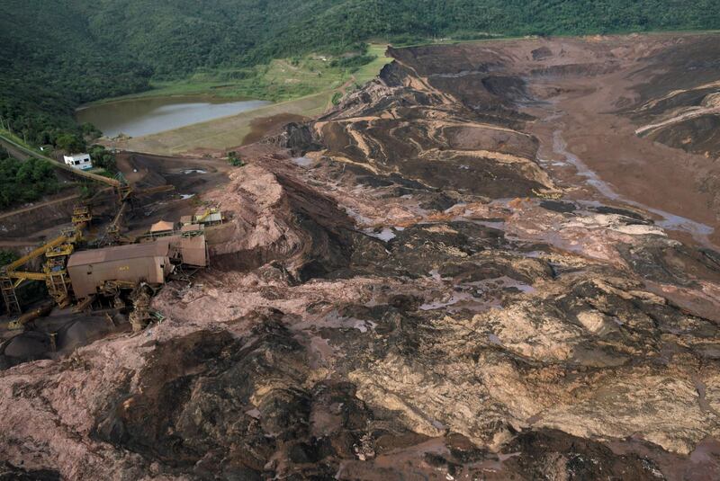 General view from above of a dam as rescue teams search for 200 people missing. Reuters