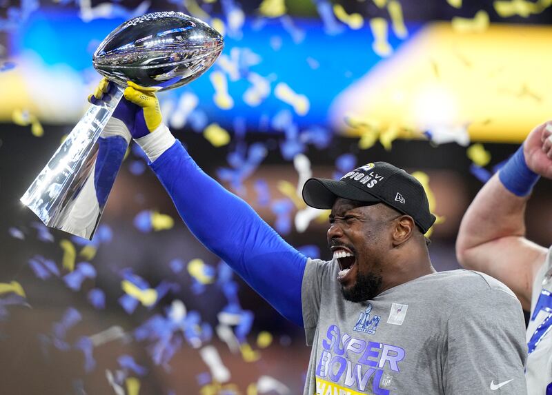 Los Angeles Rams outside linebacker Von Miller holds up the Lombardi Trophy. AP