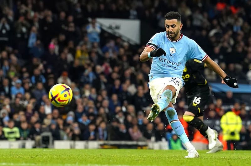 Riyad Mahrez scores from the penalty spot. PA