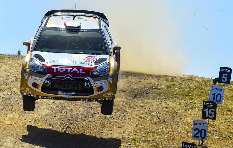 United Arab Emirates' driver Khalid Al Qassimi and co-pilot Chris Patterson in Sardinia on June 7, 2014.  AFP