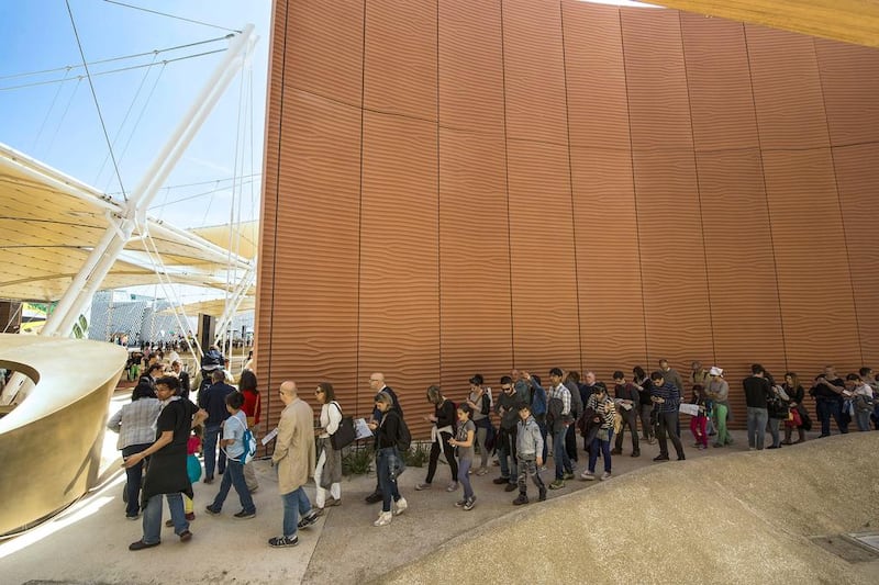 Visitors queue as they wait to enter the UAE pavilion at the Milan Expo 2015. Giuseppe Aresu / The National