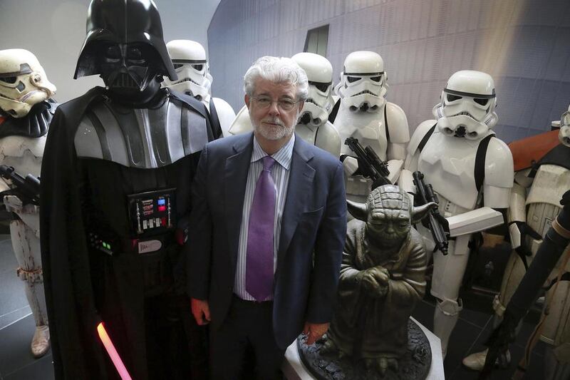 George Lucas and his wife Mellody Hobson (not pictured) have pledged to donate half their wealth to charity. Wong Maye-E / AP Photo